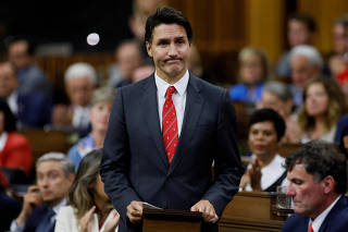 FILE PHOTO: Canada's Prime Minister Justin Trudeau rises to make a statement in the House of Commons on Parliament Hill in Ottawa