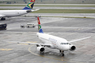FILE PHOTO: South African Airways (SAA) plane taxis after landing at O.R. Tambo International Airport in Johannesburg
