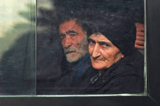 A picture and its story: Fleeing from Nagorno-Karabakh on the mountain road west