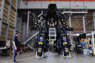 CEO Ryo Yoshida and CTO Akinori Ishii ARCHAX, a giant human-piloted robot, in Yokohama, Japan