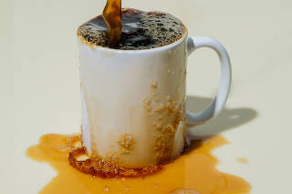 An overflowing cup of coffee in New York, Sept. 18, 2023. (Eric Helgas/The New York Times)