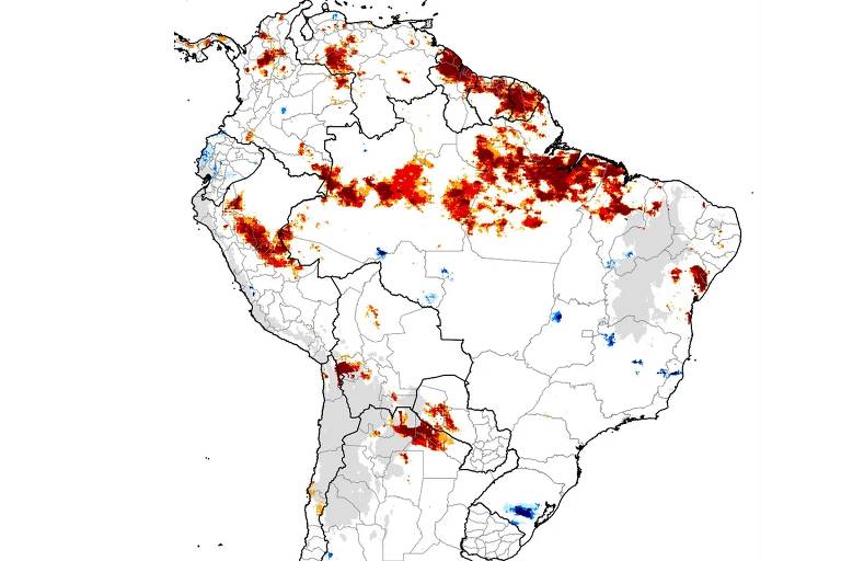 Mapa mostra regiões em vermelho no norte e nordeste do Brasil que registraram chuva abaixo da média, e pontos em azul no sul e sudeste onde houve chuva acima da média