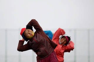 FILE PHOTO: Elderly residents exercise on the island of Yeonpyeong, which lies on the South Korean side of the Northern Limit Line (NLL), in the Yellow Sea