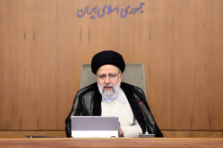 Iranian President Ebrahim Raisi speaks during a meeting with the cabinet in Tehran