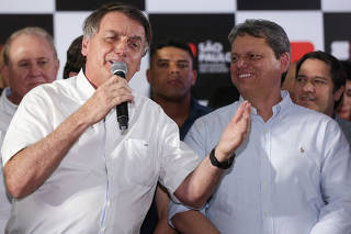 Brazil's former President Jair Bolsonaro visits a Sao Paulo's government housing program, in Barretos