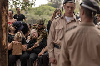 The funeral of an Israeli soldier, Yuval Ben Yaakov, at a cemetery in Kfar Menachem on Monday, Oct. 9, 2023. (Avishag Shaar-Yashuv/The New York Times)
