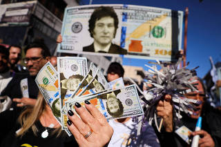 FILE PHOTO: Supporters of Argentine presidential candidate Javier Milei during a campaign rally, in Buenos Aires