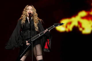 FILE PHOTO: Singer Madonna performs during her concert at the AccorHotels Arena in Paris