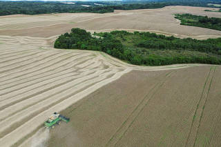 Soybeans are harvested from a field in Ponta Grossa