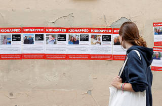 Posters on Paris street depicting missing Israeli citizens, likely to have been kidnapped by Hamas