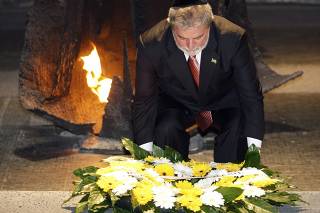 Brazil's President Lula da Silva lays a wreath during a ceremony at Yad Vashem in Jerusalem