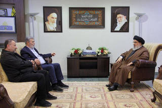Lebanon's Hezbollah leader Sayyed Hassan Nasrallah meets Jihad Secretary General Ziyad al-Nakhalah and deputy leader of Hamas, Sheikh Saleh al-Arouri at an unidentified location