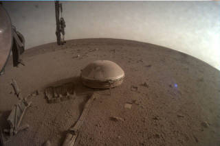 View of the InSight's seismometer on the Martian surface, in one of the last images taken by NASA's InSight Mars lander