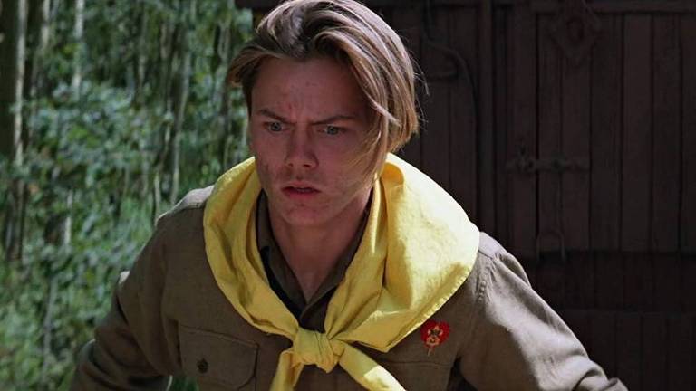 River Phoenix como Indy jovem em "Indiana Jones e a Última Cruzada" (1989)