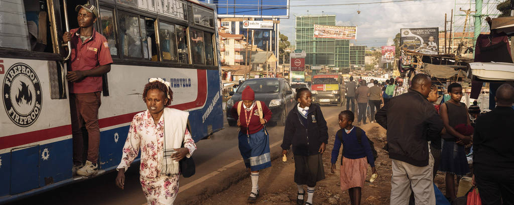 Commuters in the rapidly-urbanizing town of Ruaka, outside Nairobi, Kenya