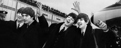 (FILES) English band the Beatles with, from left to right, John Lennon, Ringo Starr, Paul McCartney and George Harrison, arrive at John F. Kennedy Airport in New York, United States, where they're greeted by a large crowd on February 7, 1964. Beatlemania hit the United States after The Beatles performed on The Ed Sullivan Show in February 09, 1964. A new Beatles song produced with a little help from artificial intelligence and including the vocals of John Lennon will be released on November 2, 2023, more than four decades after it was originally recorded as a demo. 
