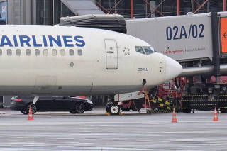A general view of airplanes on the tarmac after a man drove through a barrier onto the grounds of the city's airport with a child in his car in Hamburg