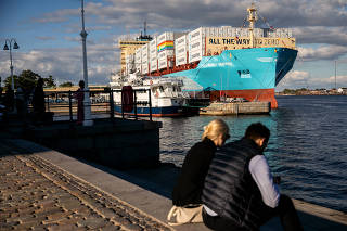 The container ship Laura Maersk, commissioned by shipping giant Maersk with an engine that can burn traditional heavy fuel oil or green methanol, at port in Copenhagen, Sept, 14, 2023. (Betina Garcia/The New York Times)