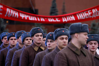 People attend an exhibition marking the anniversary of 1941 historical parade in Moscow