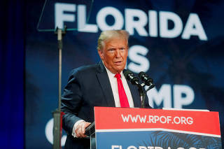 FILE PHOTO: Republican presidential candidates speak in Florida