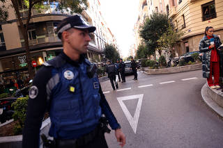 Police work at the site where Alejo Vidal-Quadras, former head of Spain's People's Party in the Catalonia region, was shot in the face, in Madrid