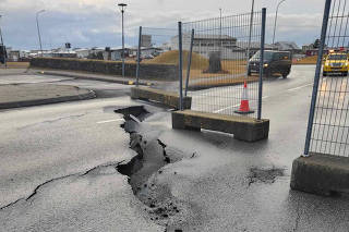 Cracks emerge on a road due to volcanic activity in Grindavik