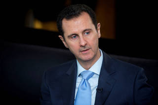 FILE PHOTO: Syria's President Bashar al-Assad is seen during an interview in Damascus