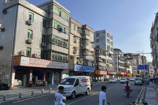 A typical ?urban village? of low-slung apartment buildings and mom-and-pop storefronts in Shenzhen, China, where there are hundreds of such areas, in November 2023. (Keith Bradsher/The New York Times)