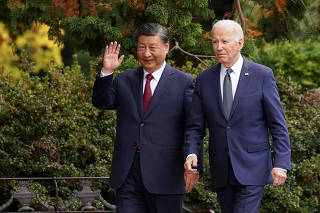 FILE PHOTO: U.S. President Joe Biden meets with Chinese President Xi Jinping on the sidelines of APEC summit, in Woodside