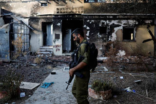 Aftermath of a deadly infiltration by Hamas gunmen from Gaza Strip, in Kibbutz Beeri