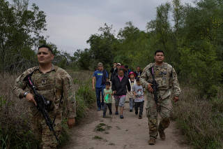 The Wider Image: Chinese migrants find tips on social media for long trek to U.S.-Mexico border