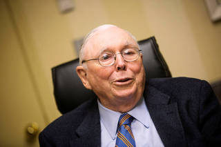 FILE PHOTO: Charlie Munger speaks to Reuters during an interview in Omaha