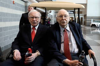 FILE PHOTO: Berkshire Hathaway Chairman Warren Buffett (left) and Vice Chairman Charlie Munger at the annual Berkshire shareholder shopping day in Omaha