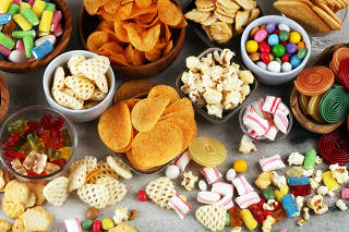 Salty snacks. Pretzels, chips, crackers and candy sweets.