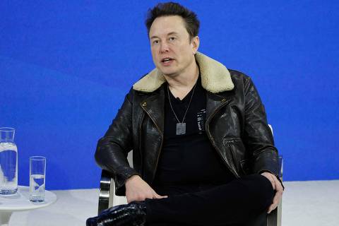 NEW YORK, NEW YORK - NOVEMBER 29: C.E.O. of Tesla, Chief Engineer of SpaceX and C.T.O. of X Elon Musk speaks during the New York Times annual DealBook summit on November 29, 2023 in New York City. Andrew Ross Sorkin returns for the NYT summit for a day of interviews with Vice President Kamala Harris, President of Taiwan Tsai Ing-Wen, C.E.O. of Tesla, Chief Engineer of SpaceX and C.T.O. of X Elon Musk, former Speaker of the U.S. House of Representatives Rep. Kevin McCarthy (R-CA) and leaders in business, politics and culture.   Michael M. Santiago/Getty Images/AFP (Photo by Michael M. Santiago / GETTY IMAGES NORTH AMERICA / Getty Images via AFP)