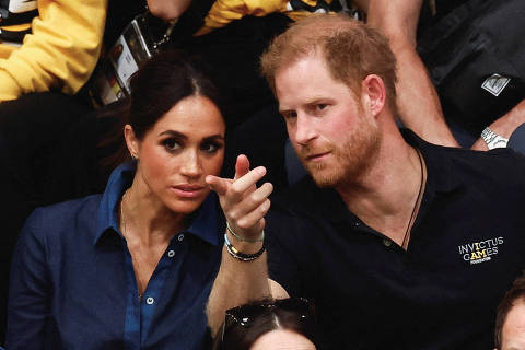FILE PHOTO: Britain's Prince Harry, Duke of Sussex and his wife Meghan, Duchess of Sussex, attend the sitting volleyball finals at the 2023 Invictus Games, an international multi-sport event for injured soldiers, in Duesseldorf, Germany September 15, 2023. REUTERS/Piroschka Van De Wouw/File Photo ORG XMIT: FW1