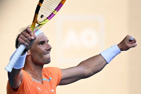 (FILES) Spain's Rafael Nadal celebrates after winning against Britain's Jack Draper during their men's singles match on day one of the Australian Open tennis tournament in Melbourne on January 16, 2023. Spaniard Rafael Nadal, absent from the courts for almost a year with a hip injury, announced on December 1, 2023 that he would return to competition in Brisbane next month ahead of the Australian Open. (Photo by WILLIAM WEST / AFP)