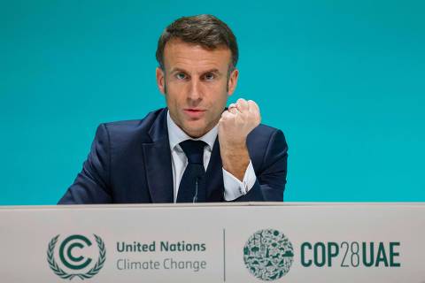France's President Emmanuel Macron speaks during a press conference at the COP28 United Nations climate summit in Dubai on December 2, 2023. The COP28 conference opened on December 1 with an early victory as nations agreed to launch a 