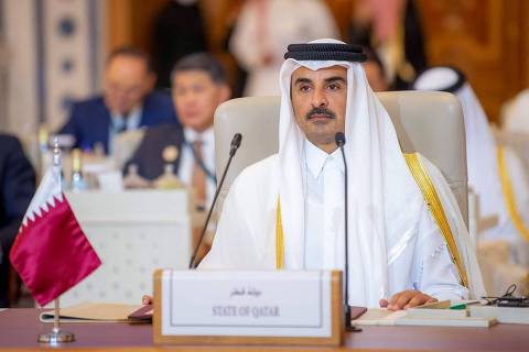 This handout picture provided by the Saudi Press Agency (SPA) on November 11, 2023, shows Qatar's Emir Sheikh Tamim bin Hamad al-Thani attending an emergency meeting of the Arab League and the Organisation of Islamic Cooperation (OIC), in Riyadh. Arab leaders and Iran's president are in the Saudi capital on November 11, for a summit meeting expected to underscore demands that Israel's war in Gaza end before the violence draws in other countries. The emergency meeting of the Arab League and the Organisation of Islamic Cooperation (OIC) comes after Hamas militants' bloody October 7 attacks that Israeli officials say left about 1,200 people dead and 239 taken hostage. (Photo by Ahmed NURELDINE / SAUDI PRESS AGENCY / AFP) / RESTRICTED TO EDITORIAL USE - MANDATORY CREDIT 