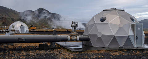 Domes are seen near the facility of Icelandic startup Carbfix in Olfus, Iceland, November 21, 2023. Icelandic startup Carbfix is the world's first CO2 mineral storage operator, permanently sequestering CO2 by mixing it with water and injecting into basalt rock. At its facility in Olfus, on the southwestern coast of Iceland, CO2 piped in from the nearby power plant is being mixed with water drawn up from the ground and injected into the basalt rock below. REUTERS/Marko Djurica ORG XMIT: HFS-PPP-MDJ107