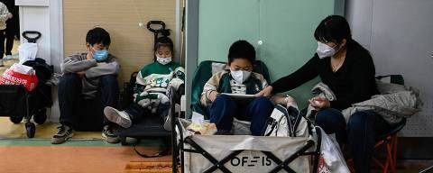Children receive a drip at a children hospital in Beijing on November 23, 2023. The World Health Organization has asked on November 23, 2023, China for more data on a respiratory illness spreading in the north of the country, urging people to take steps to reduce the risk of infection. China has reported an increase in 