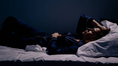 Sad alone woman lying the bed. Insomnia concept. (Credit:Burdun/Adobe Stock )