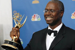 FILE PHOTO: Braugher poses after winning an Emmy for outstanding lead actor in a miniseries or movie for his work on 