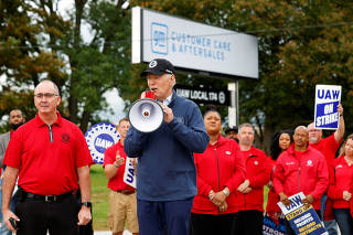 FILE PHOTO: U.S. President Joe Biden joins United Auto Workers picket line in Belleville, Michigan