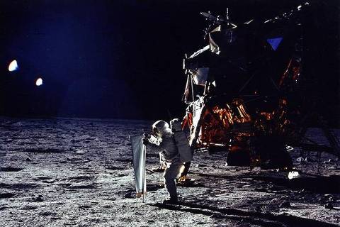 U.S. astronaut Buzz Aldrin erects solar wind experiment.