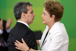 Brazil's new Justice Minister Wellington Cesar Lima e Silva is greeted by Brazil's President Dilma Rousseff during his inauguration ceremony at Planalto Palace in Brasilia