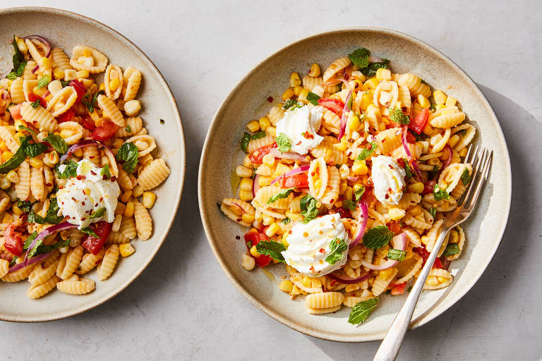 Pasta with corn, mint and red onions. A snap to throw together, this lively dish takes the best parts of pasta salad and makes them a whole lot better, Melissa Clark writes. Food styled by Barrett Washburne. (Linda Xiao/The New York Times)