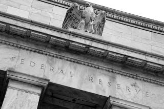 FILE PHOTO: An eagle tops the U.S. Federal Reserve building's facade in Washington