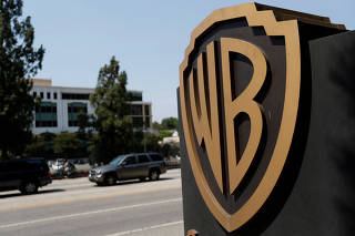 FILE PHOTO: A Warner Bros. Entertainment Inc. logo is pictured at one of the studio's gates in Burbank