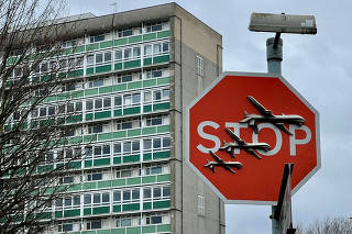 Banksy artwork showing drones on stop sign stolen in London